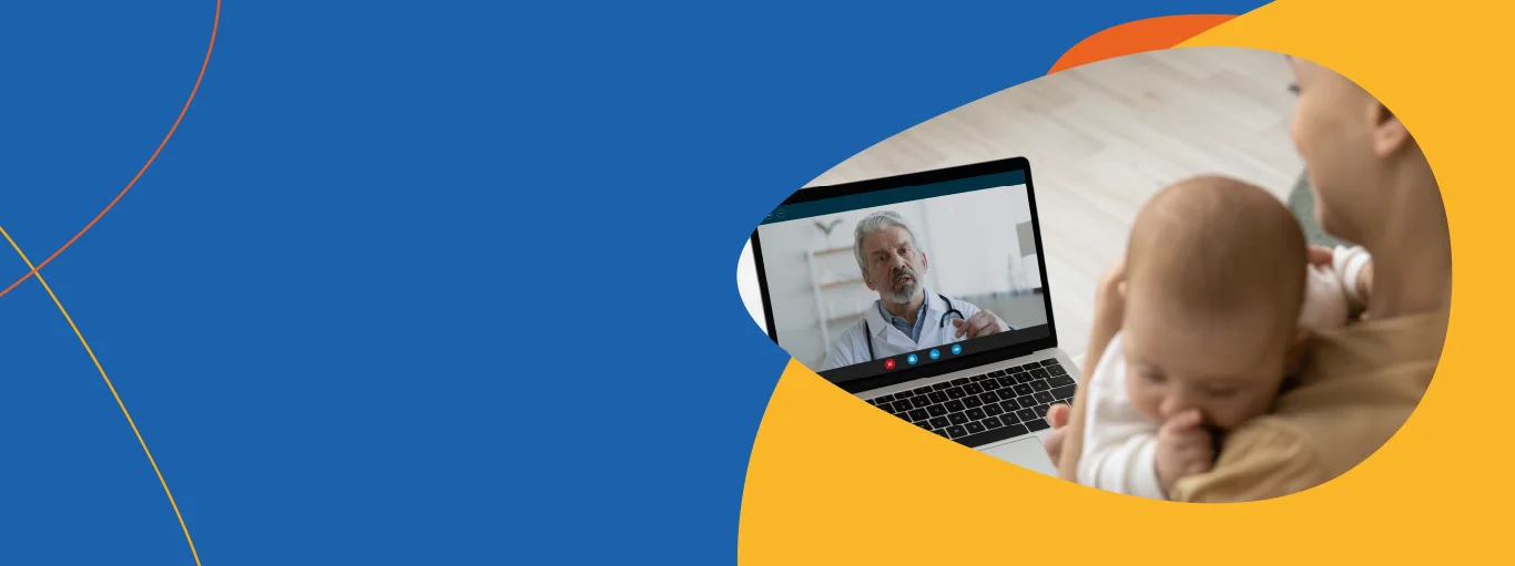 Mulher com bebê no colo olhando para o notebook e falando com o médico via teleconsulta